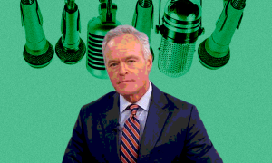 Scott Pelley in front of microphones 