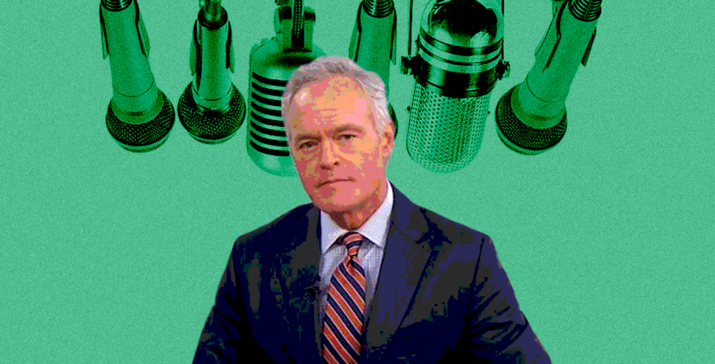 Scott Pelley in front of microphones 